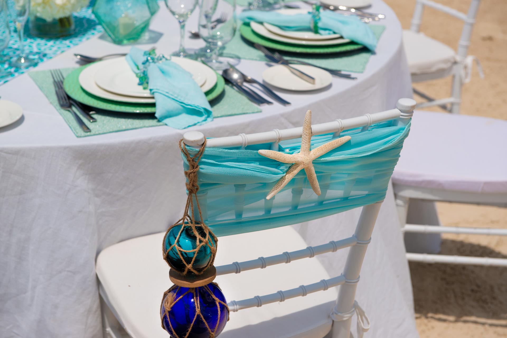 Chair at beach wedding reception