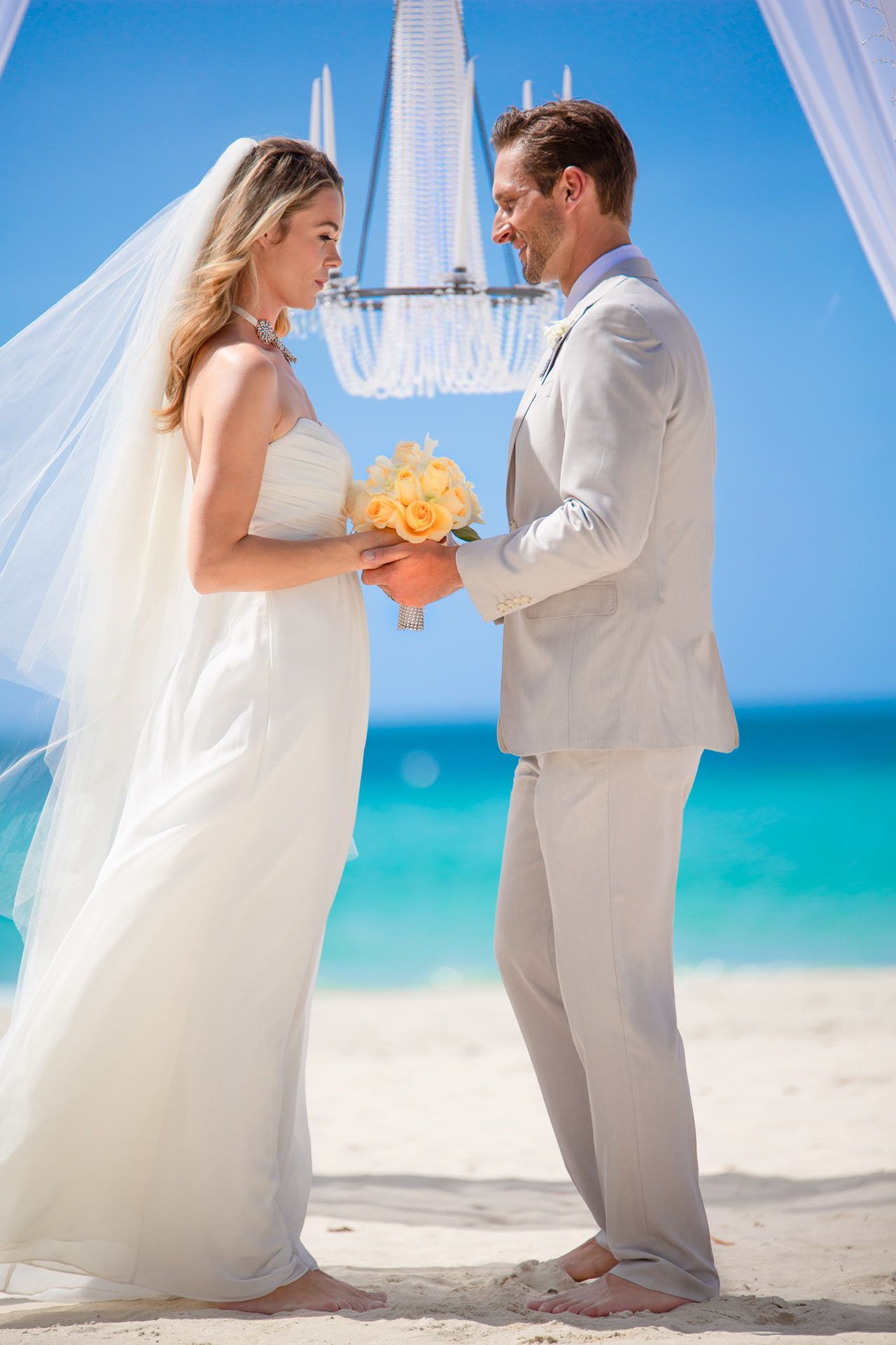 Sandals beach wedding couple