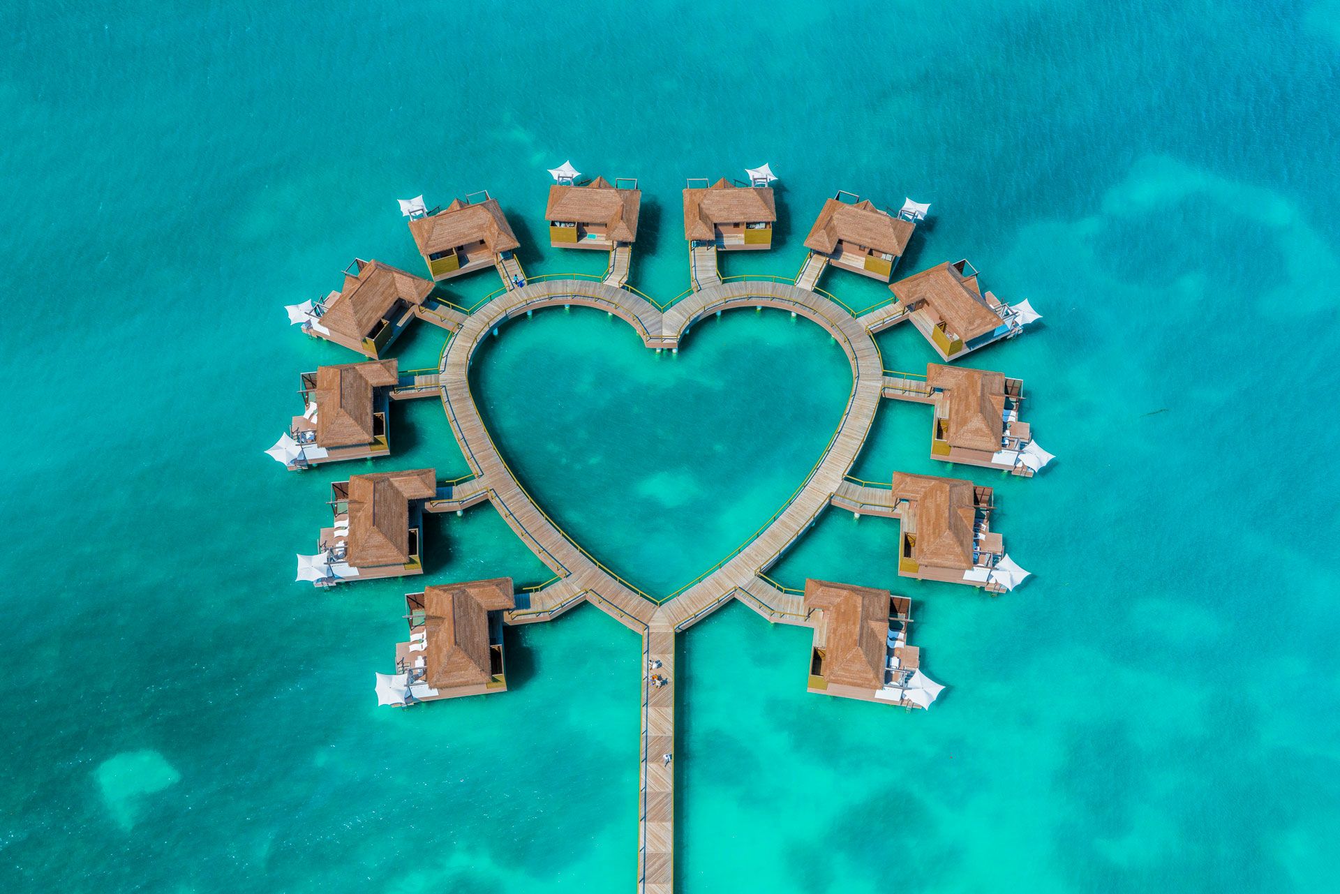 heartshaped overwater bungalows sandals