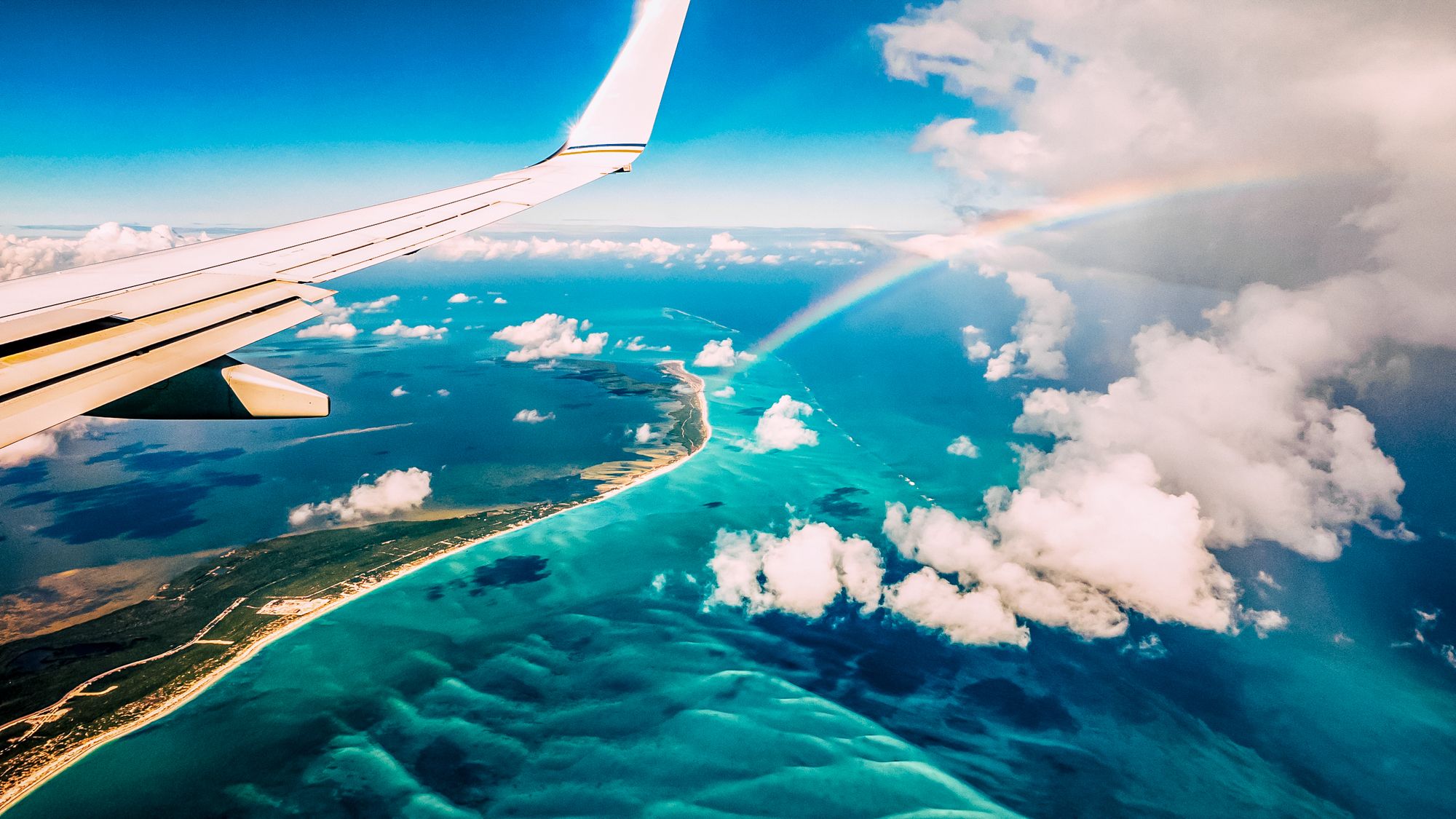 Aiplane Window Wing Flying Over Caribbean