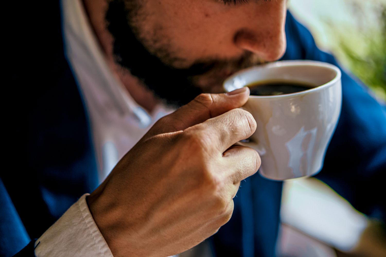 Business Man Drinking Coffee