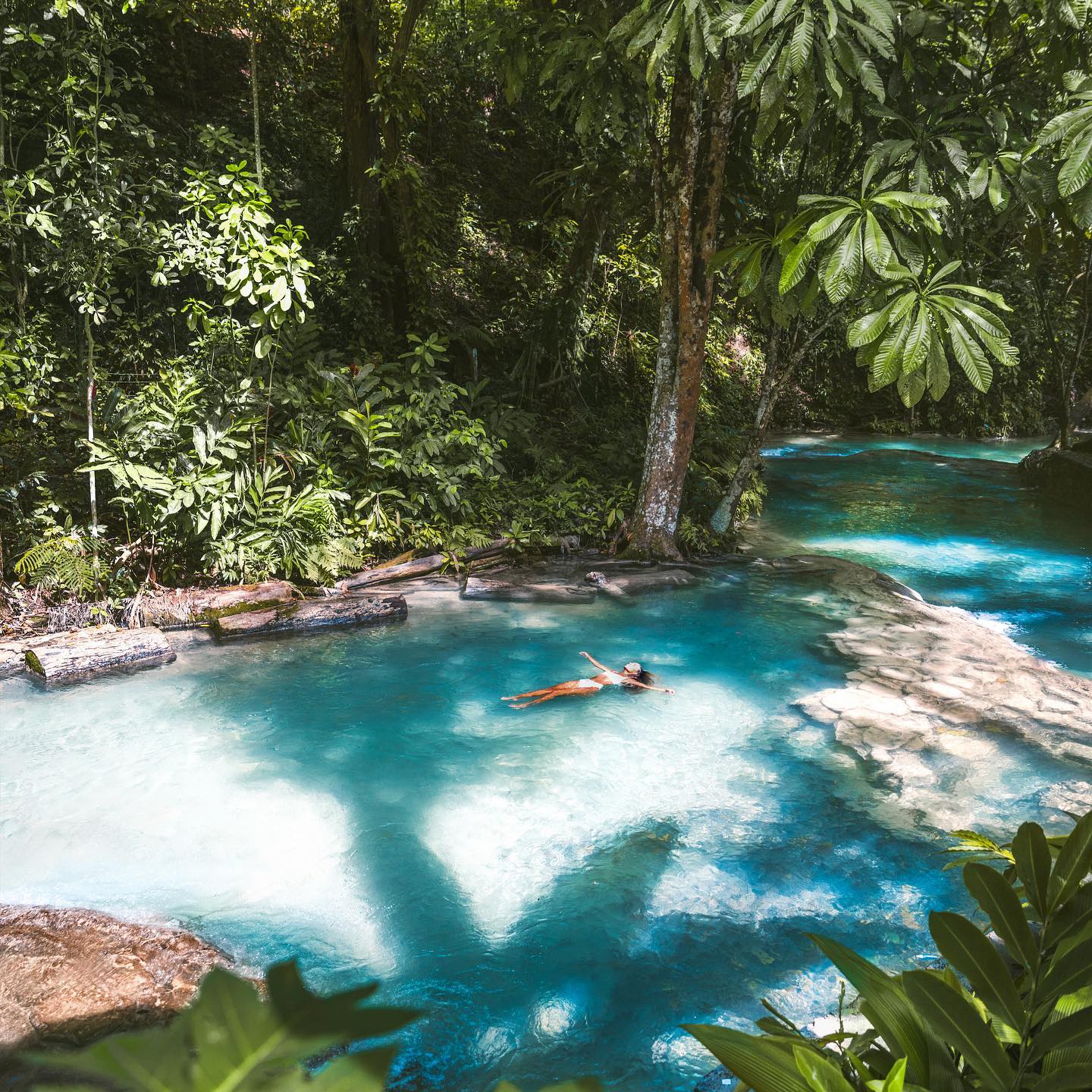 woman swimming in ocho rios blue hole