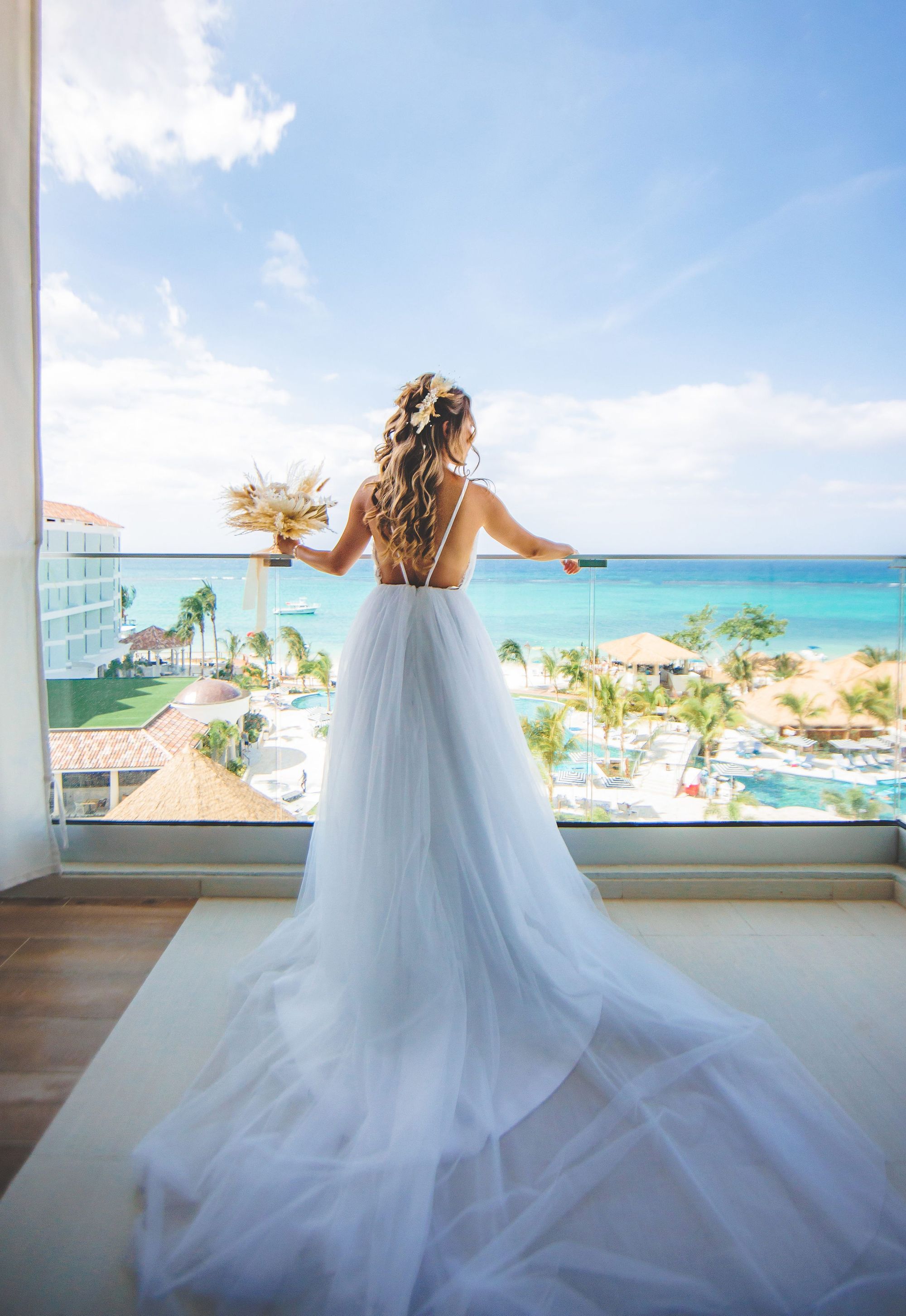 bride on balcony at sandals dunn's river