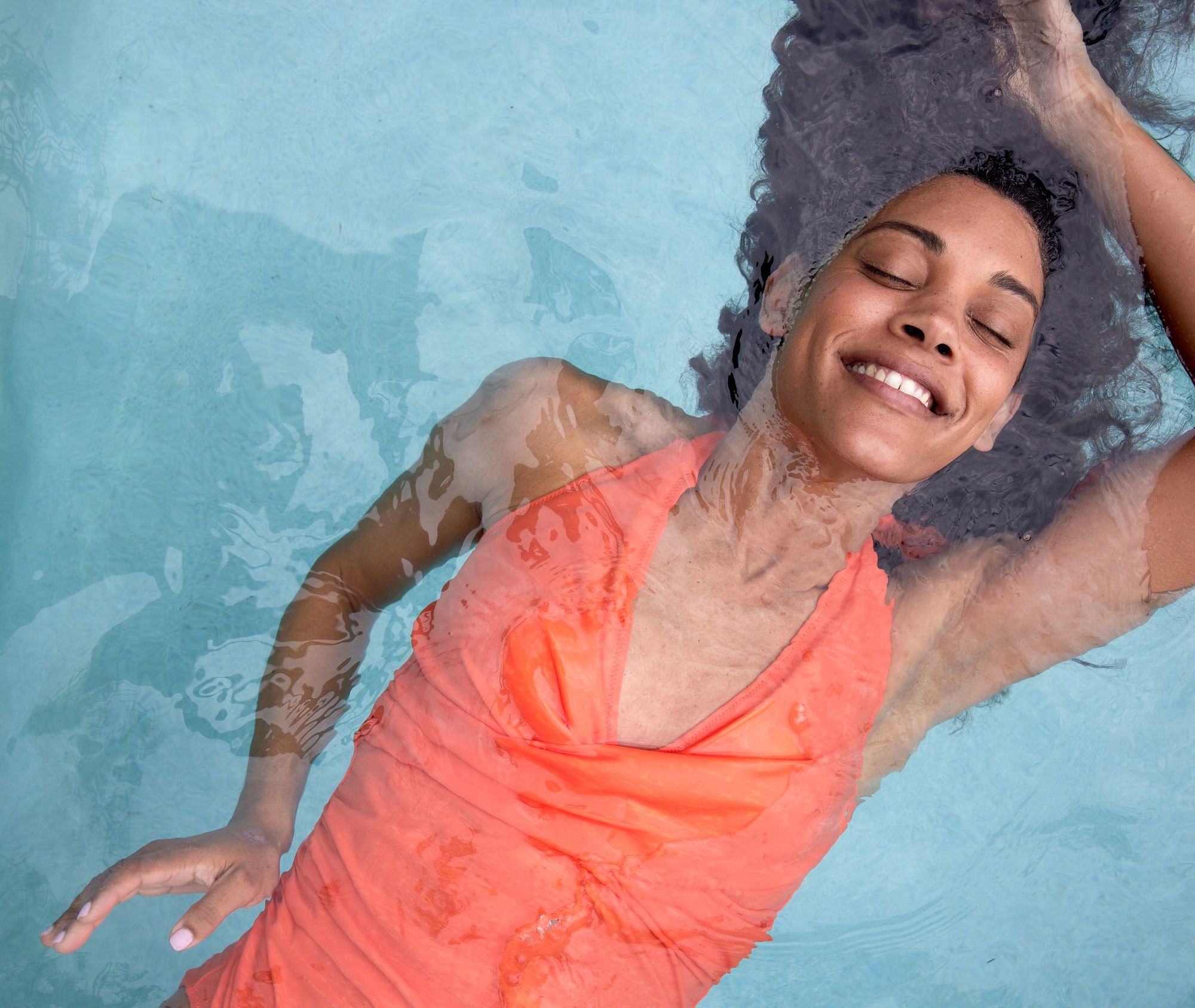 Caribbean-Lifestyle-Woman-Floating-Pool-2
