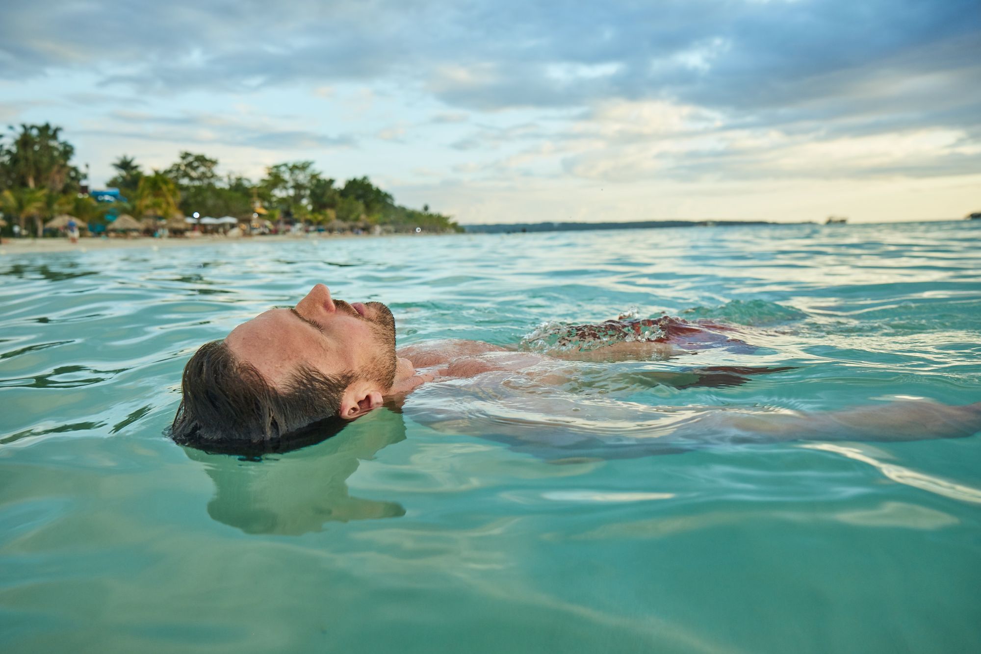 Negril-Lifestyle-Man-Floating-Water