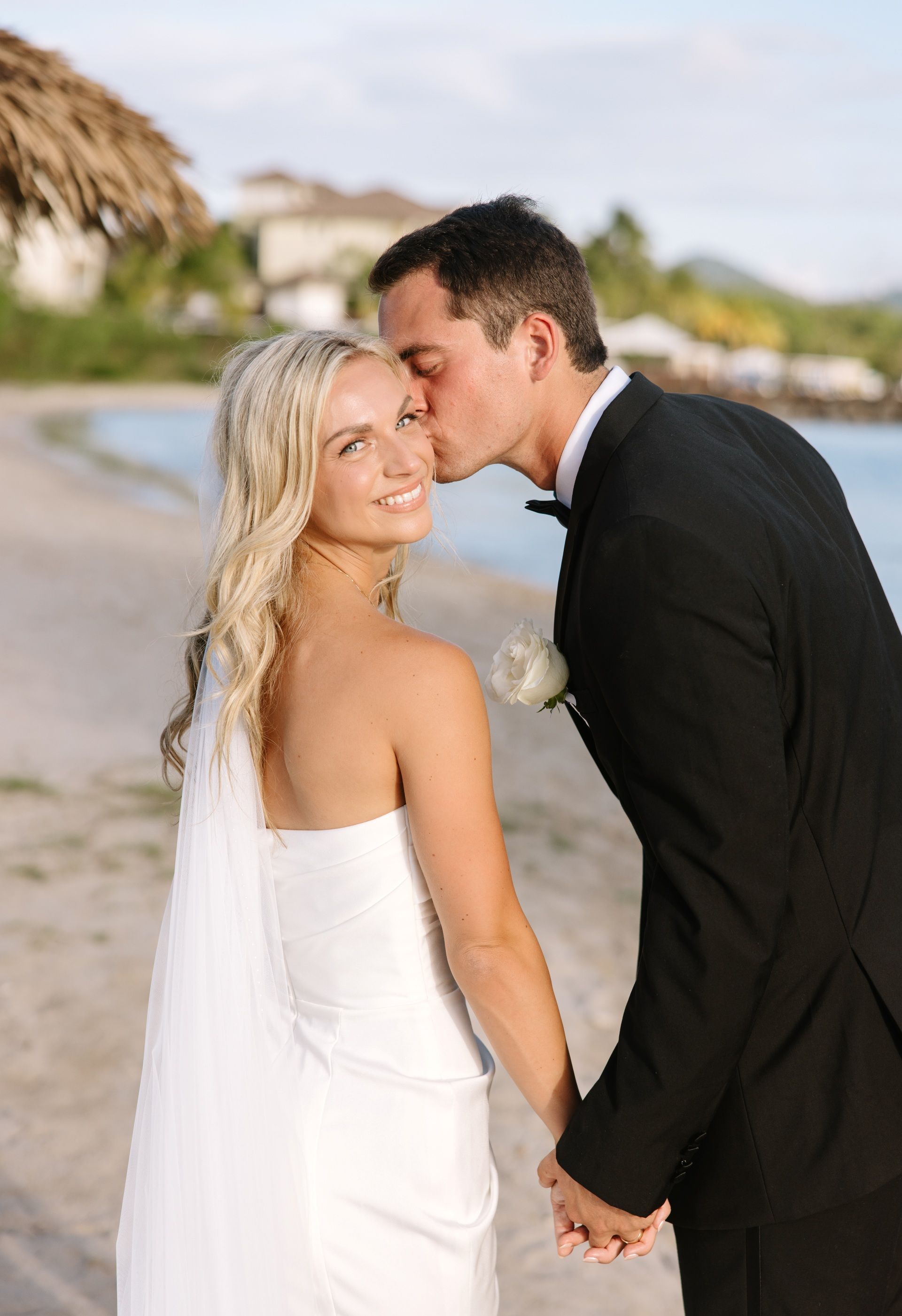 Groom kissing bride during their St. Lucia elopement