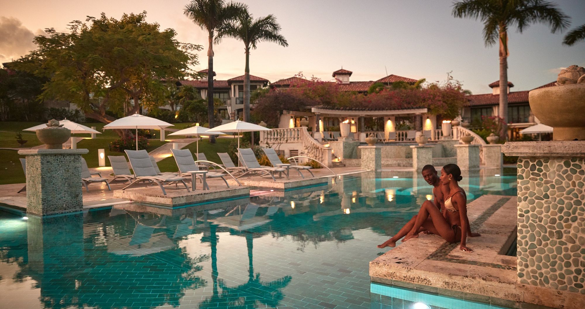 Web-Version-SLS-Lifestyle-Main-Pool-Couple-Pool-Edge