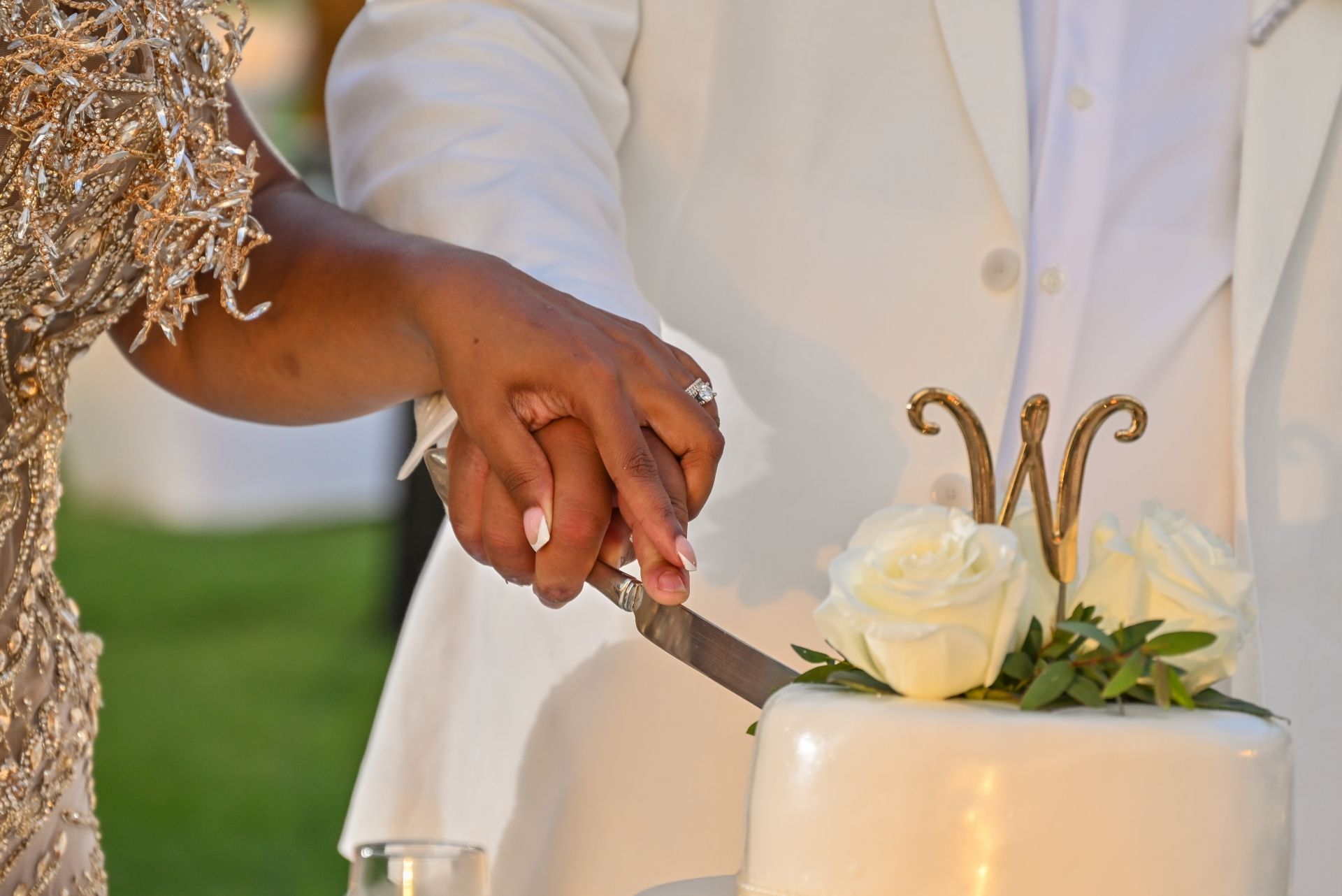 vow-renewal-cake-cutting-ring-closeup