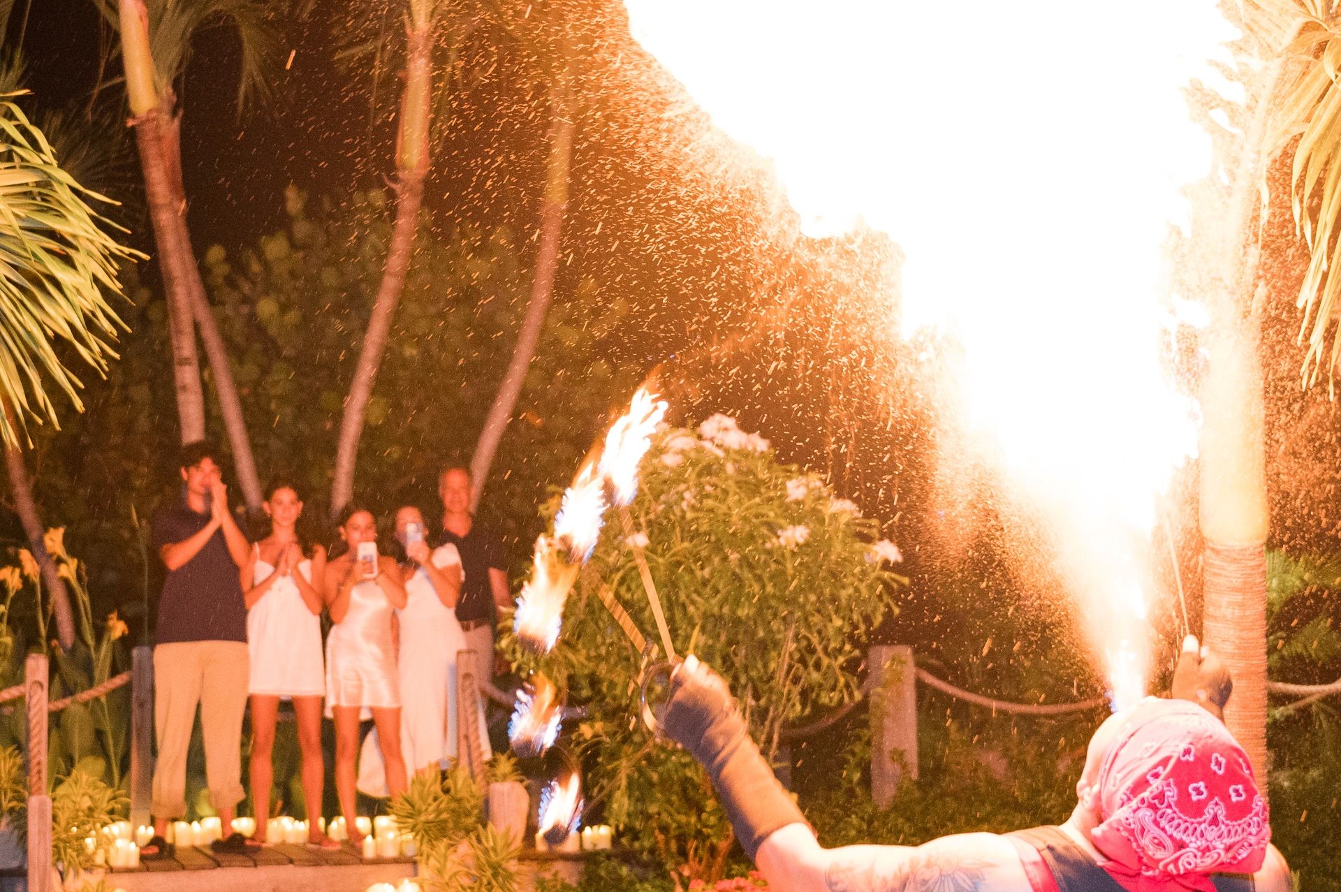 guests watching fire show wedding night entertainment Caribbean