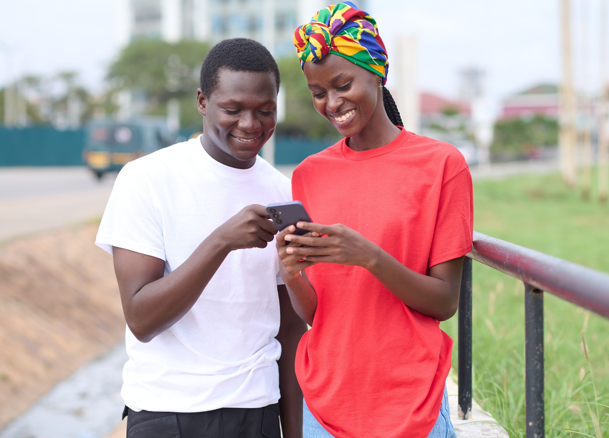 couple-talking-phone-smiling